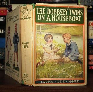 Item #51147 THE BOBBSEY TWINS ON A HOUSEBOAT. Laura Lee Hope