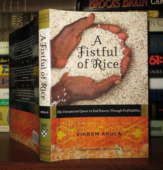 Item #52671 A FISTFUL OF RICE My Unexpected Quest to End Poverty through Profitability. Vikram Akula