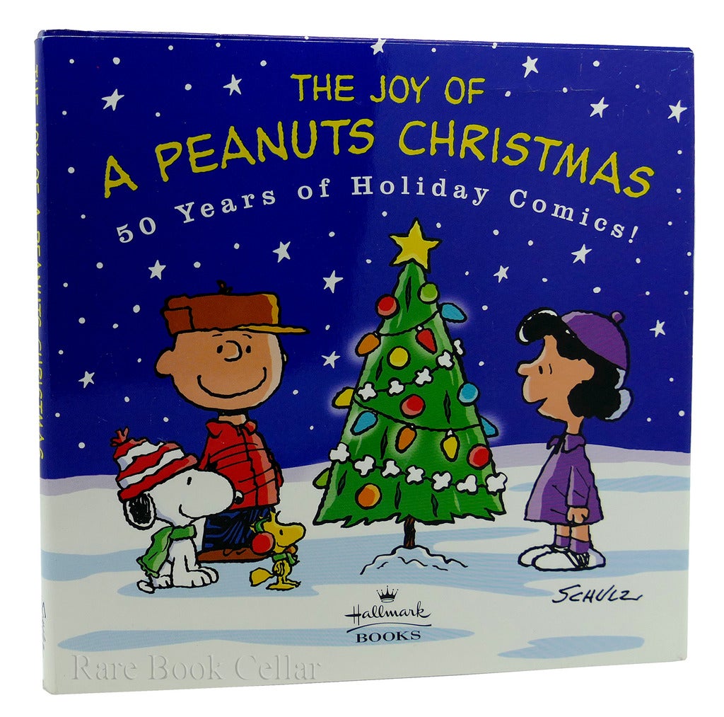 THE JOY OF A PEANUTS CHRISTMAS 50 Years of Holiday Comics! by Charles M.  Schulz on Rare Book Cellar