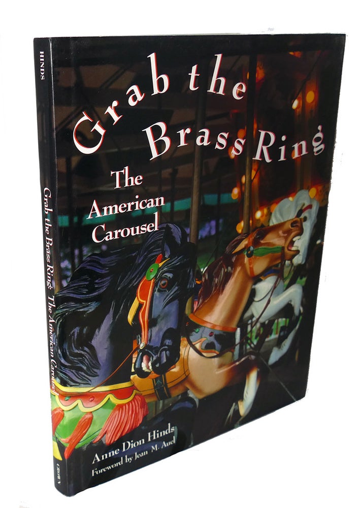 Item #93031 GRAB THE BRASS RING : The American Carousel. Jean M. Auel Anne Dion Hinds.