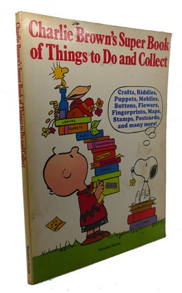 Item #102427 CHARLIE BROWN'S SUPER BOOK OF THINGS TO DO AND COLLECT. Charles M. Schulz