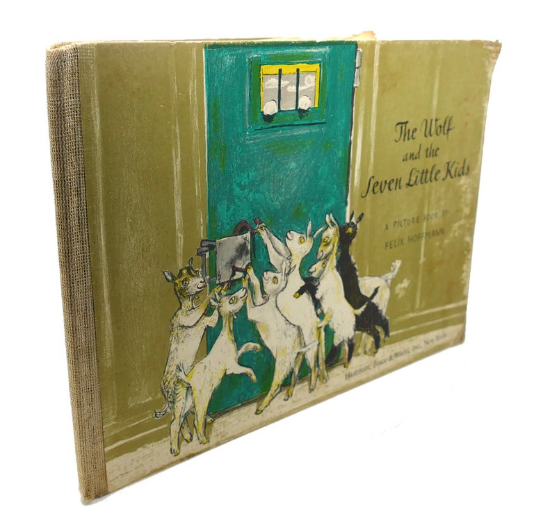 Item #109180 THE WOLF AND THE SEVEN LITTLE KIDS. Brothers Grimm Felix Hoffman.