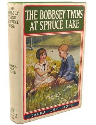 Item #110595 THE BOBBSEY TWINS AT SPRUCE LAKE. Laura Lee Hope