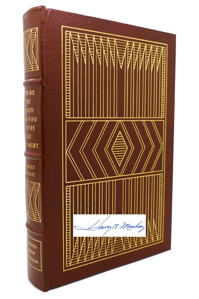 Item #132336 BEWARE THE NAKED MAN WHO OFFERS YOU HIS SHIRT : Signed Easton Press. Harvey Mackay.