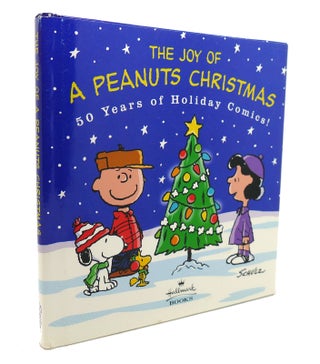 Item #132701 THE JOY OF A PEANUTS CHRISTMAS. Charles Schulz