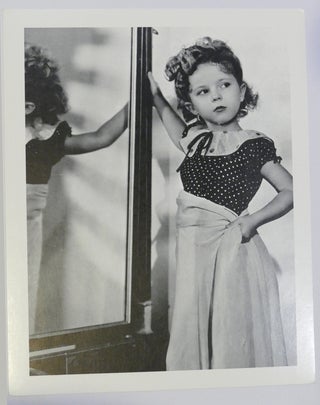Item #134476 SHIRLEY TEMPLE PHOTO By a Mirror. Shirley Temple