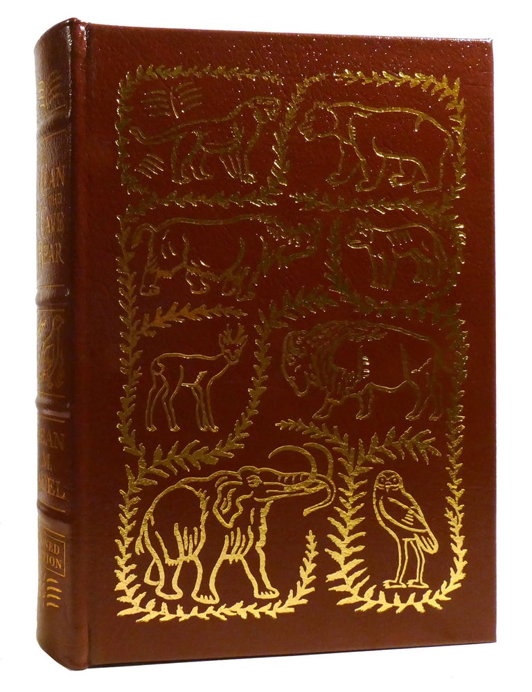 Item #209844 THE CLAN OF THE CAVE BEAR; Easton Press. Jean M. Auel.