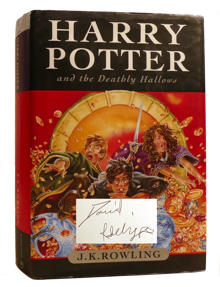 Item #212509 HARRY POTTER AND THE DEATHLY HALLOWS; Signed. J. K. Rowling - Daniel Radcliffe.