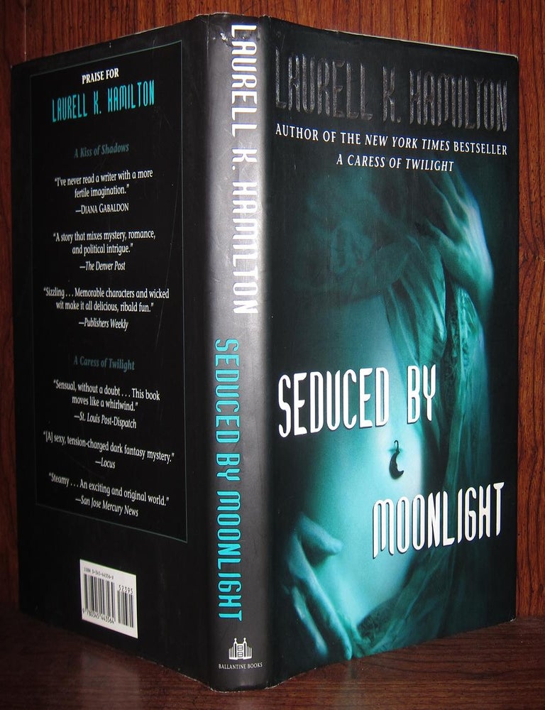 SEDUCED BY MOONLIGHT | Laurell K. Hamilton | First Edition; First Printing