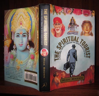 Item #41375 THE SPIRITUAL TOURIST A Personal Odyssey Through the Outer Reaches of Belief. Mick...