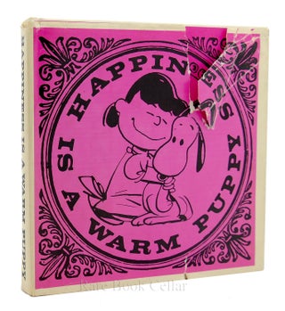 Item #87269 HAPPINESS IS A WARM PUPPY. Charles M. Schulz