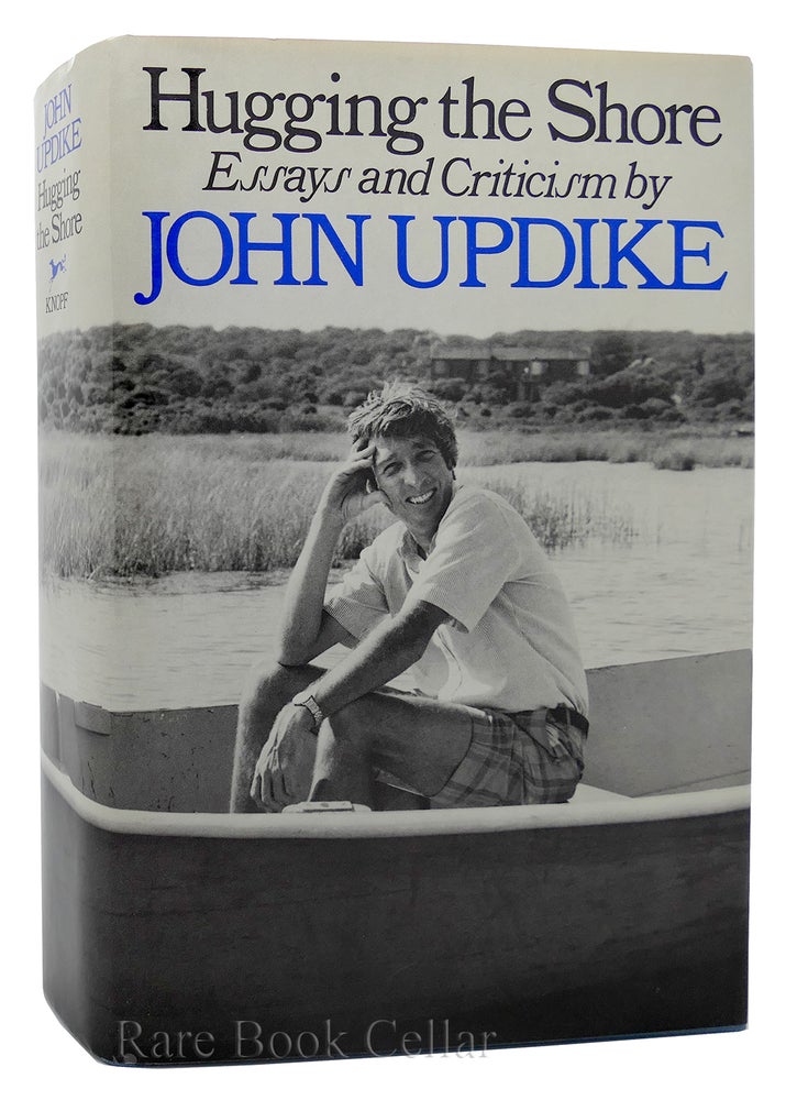 Item #87939 HUGGING THE SHORE. ESSAYS AND CRITICISM. John Updike.